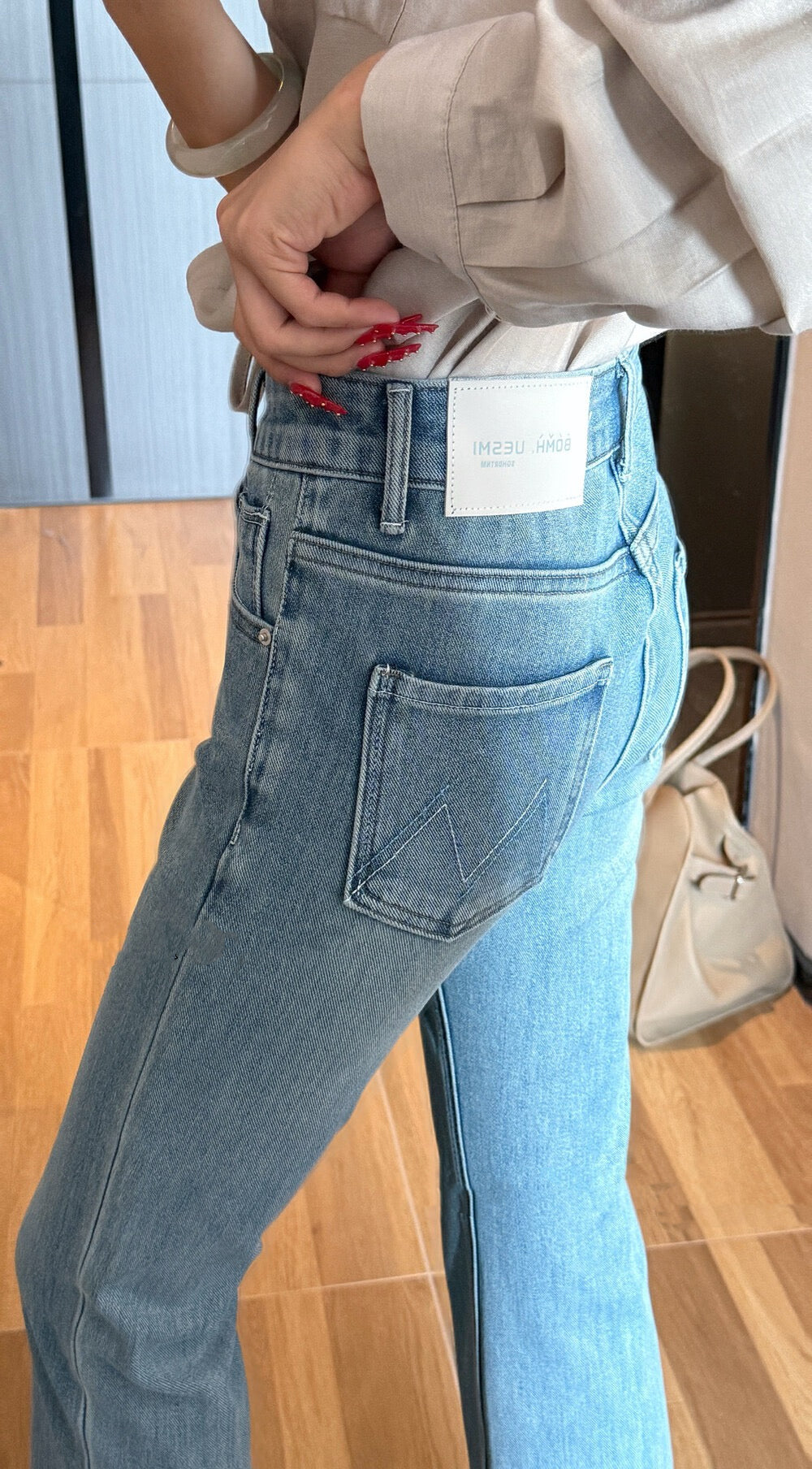 Nine-tenths flared jeans