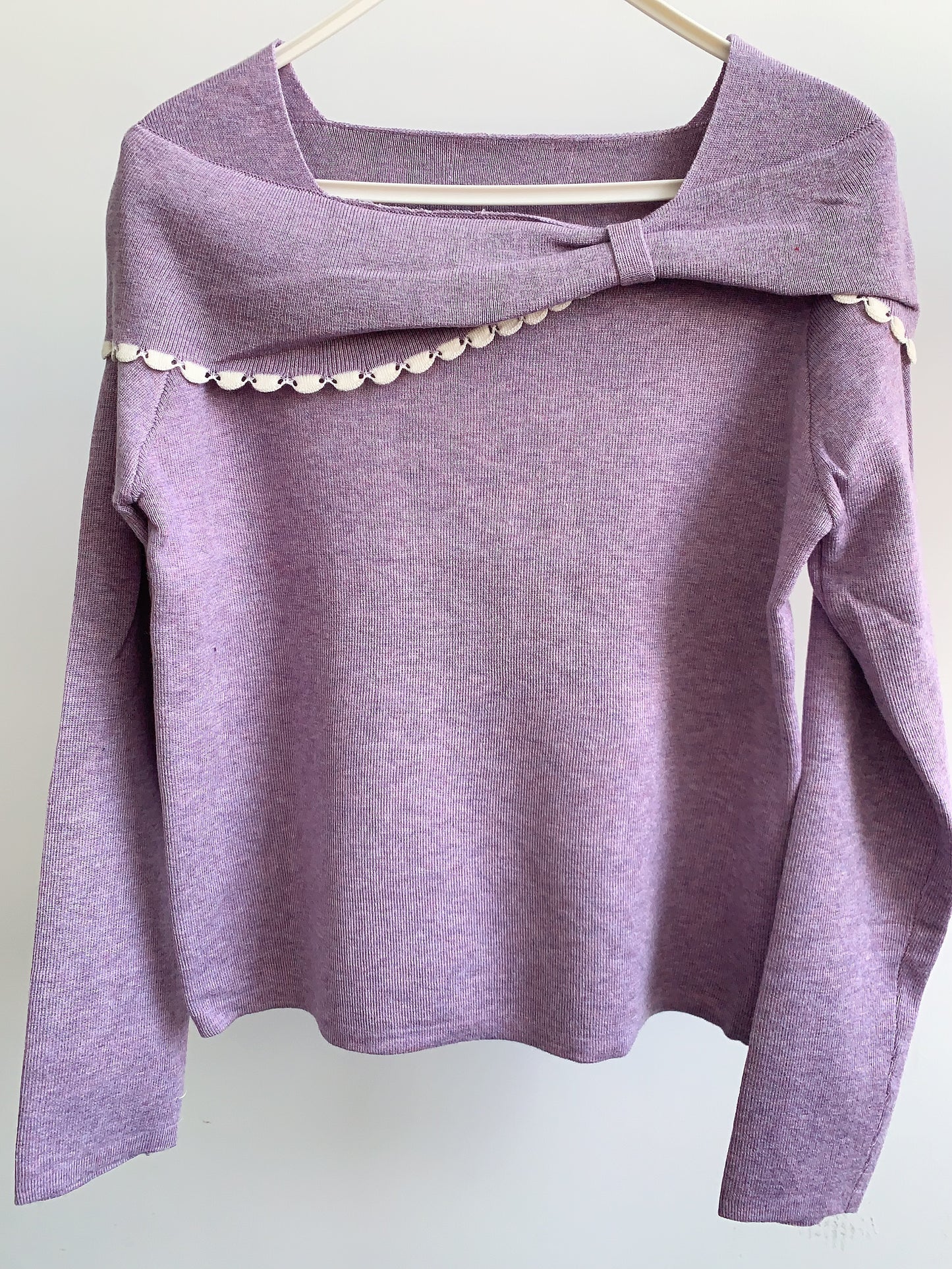 Korean-style off-shoulder bow tie knit top