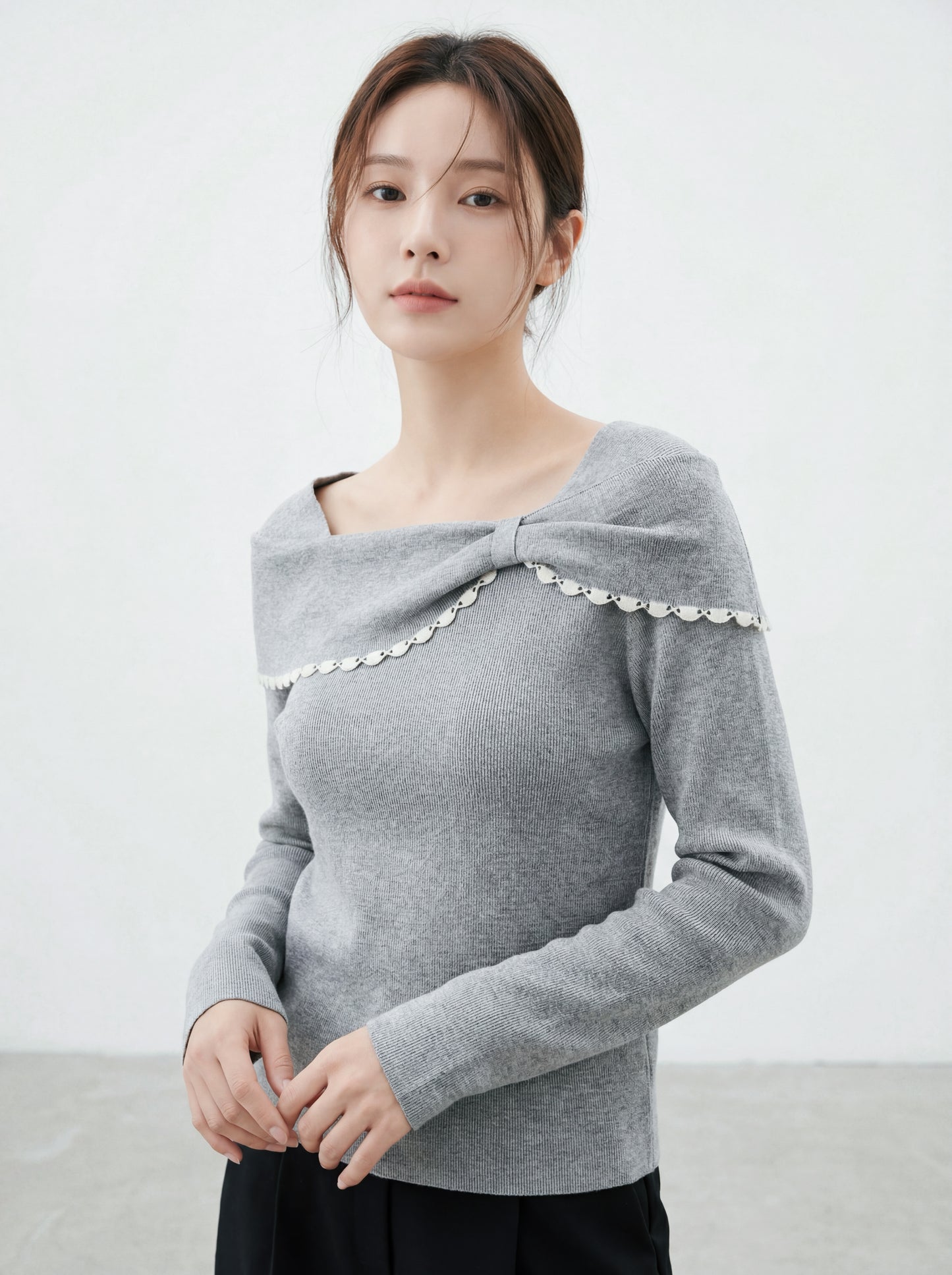 Korean-style off-shoulder bow tie knit top