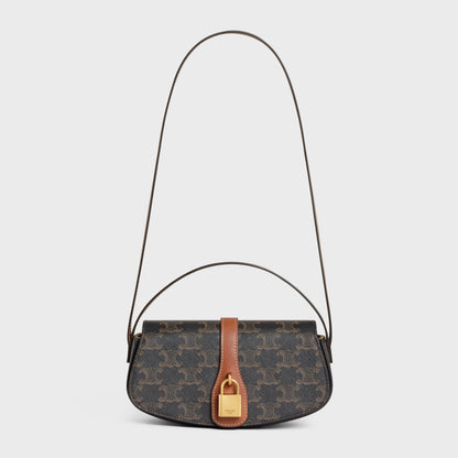 CLUTCH ON STRAP TABOU