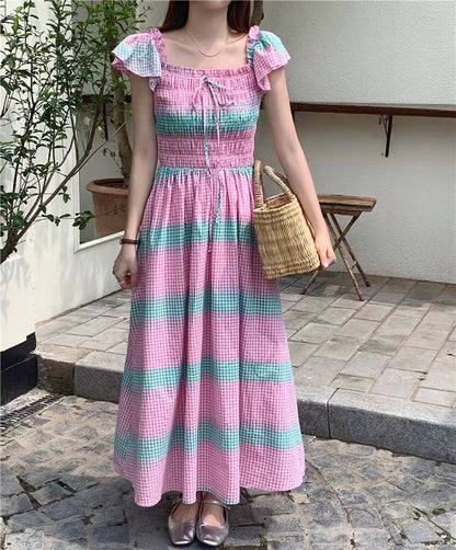 粉色一字肩修腰連身裙