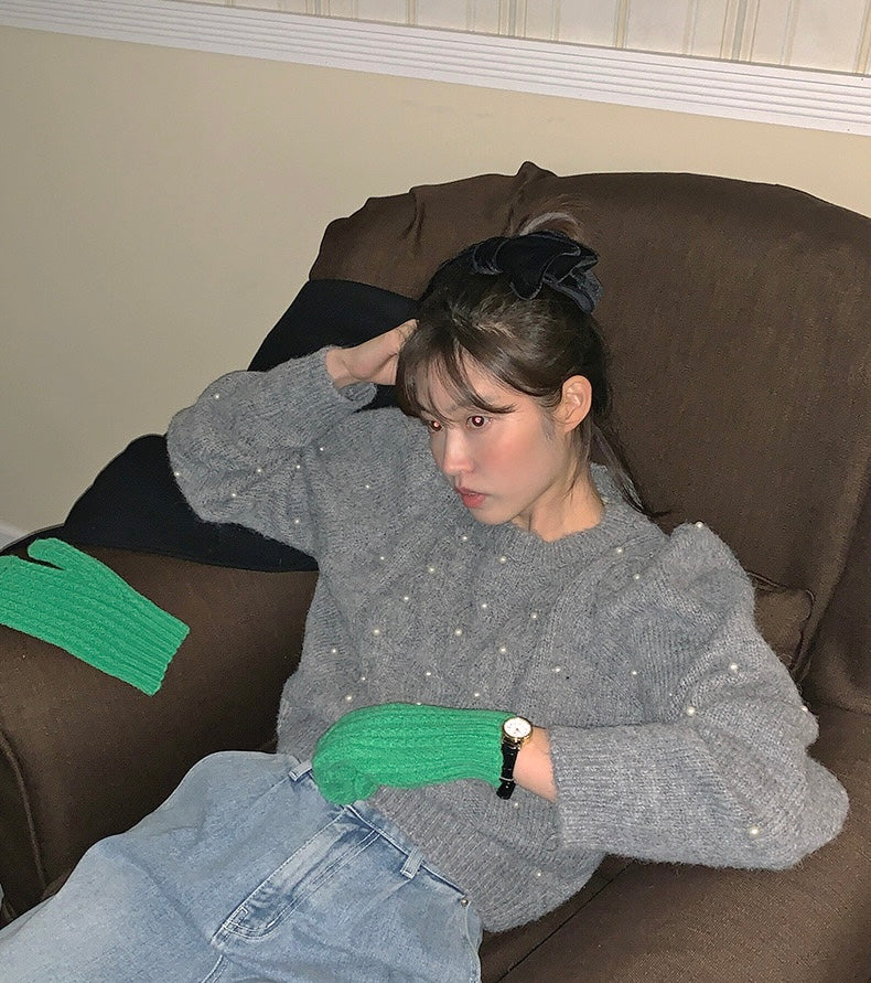 パール編みケーブル柄セーター