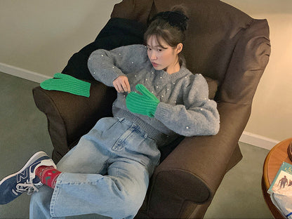 パール編みケーブル柄セーター