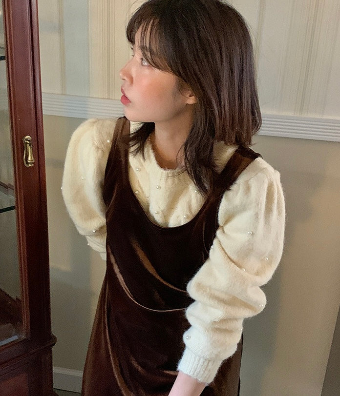 パール編みケーブル柄セーター