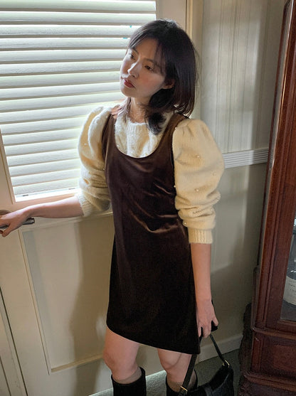 パール編みケーブル柄セーター