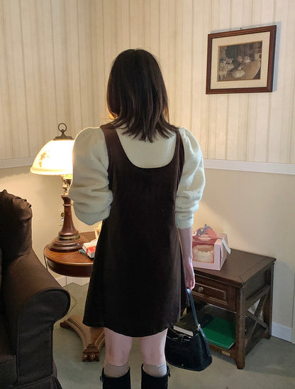 パール編みケーブル柄セーター