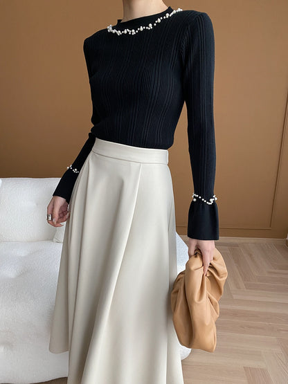 ビジュー付きフレアスリーブセーター