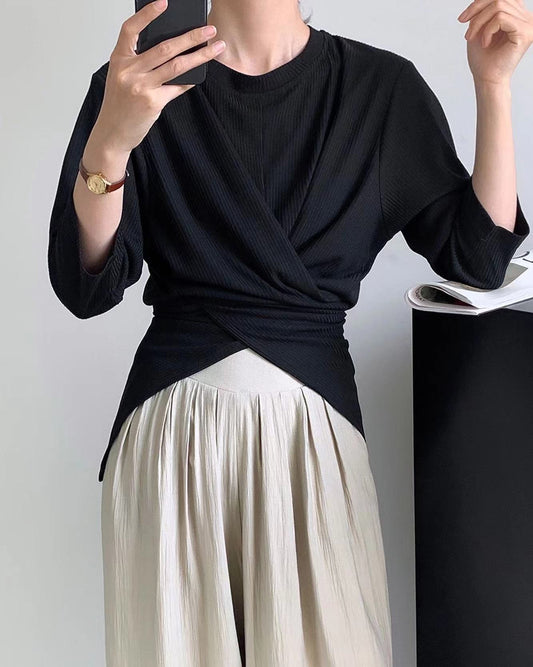Three-quarter sleeve asymmetrical waist-cinching top