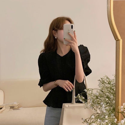 ジャカード模様のトップス