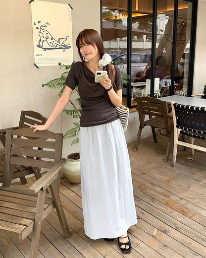 Design-inspired Asymmetric Cowl Neck Top