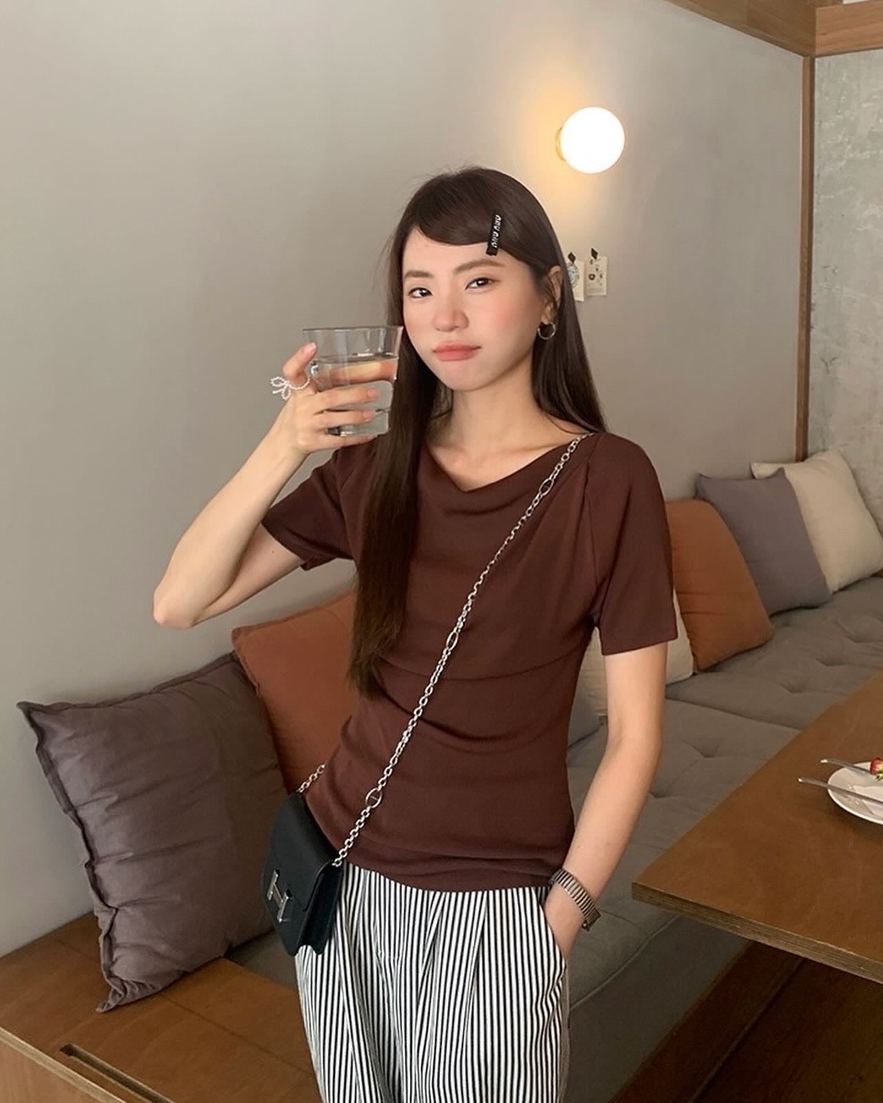 Design-inspired Asymmetric Cowl Neck Top