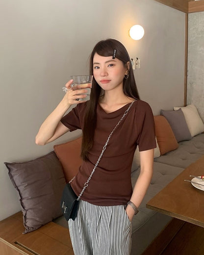 Design-inspired Asymmetric Cowl Neck Top