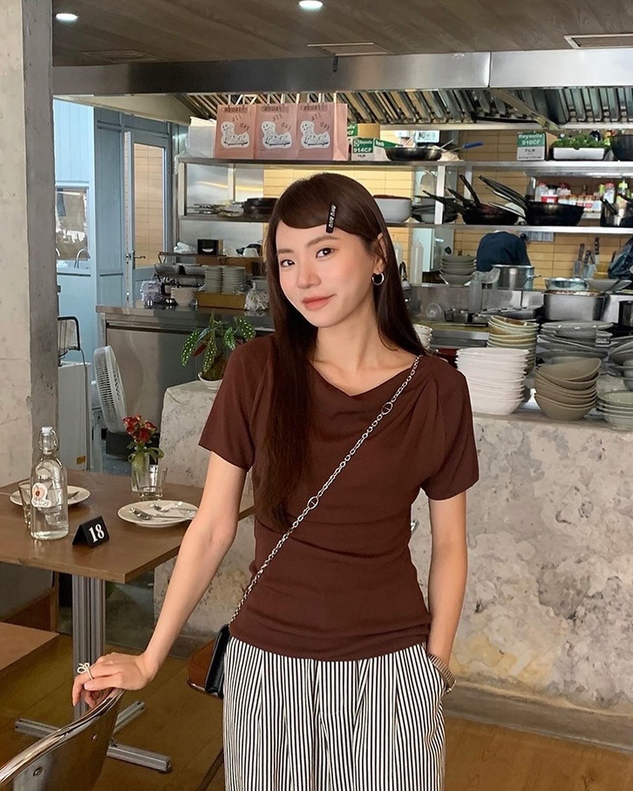 Design-inspired Asymmetric Cowl Neck Top