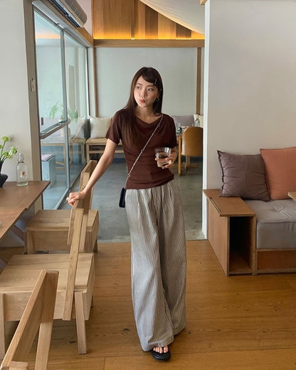 Design-inspired Asymmetric Cowl Neck Top