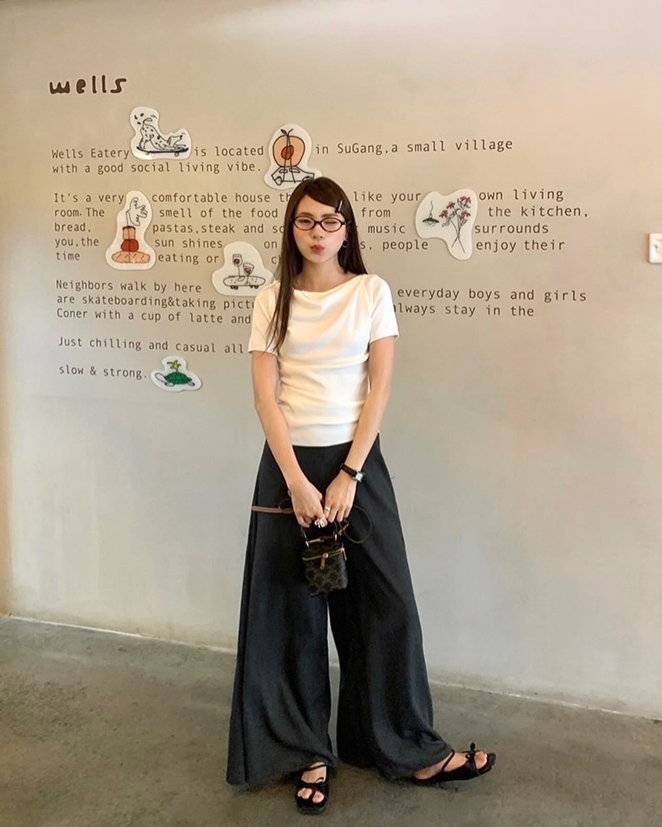 Design-inspired Asymmetric Cowl Neck Top