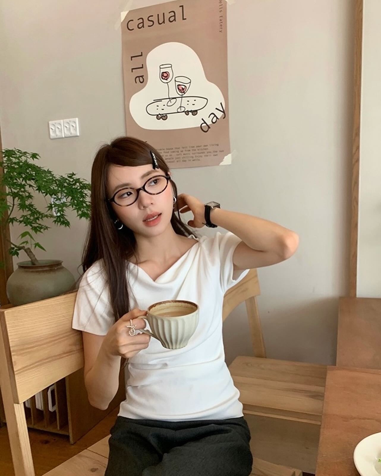 Design-inspired Asymmetric Cowl Neck Top