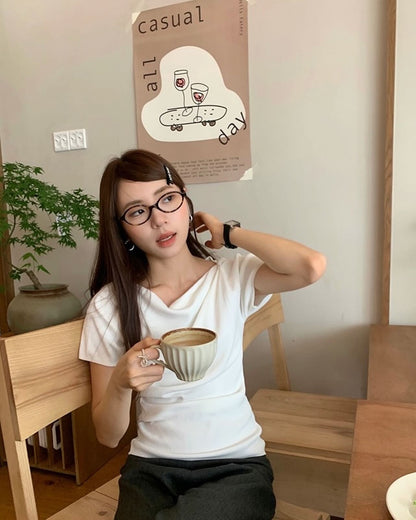 Design-inspired Asymmetric Cowl Neck Top