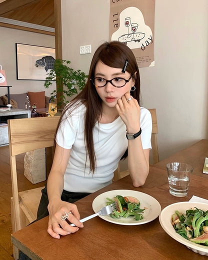 Design-inspired Asymmetric Cowl Neck Top