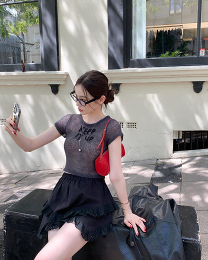 薄手ニット文字入りトップス