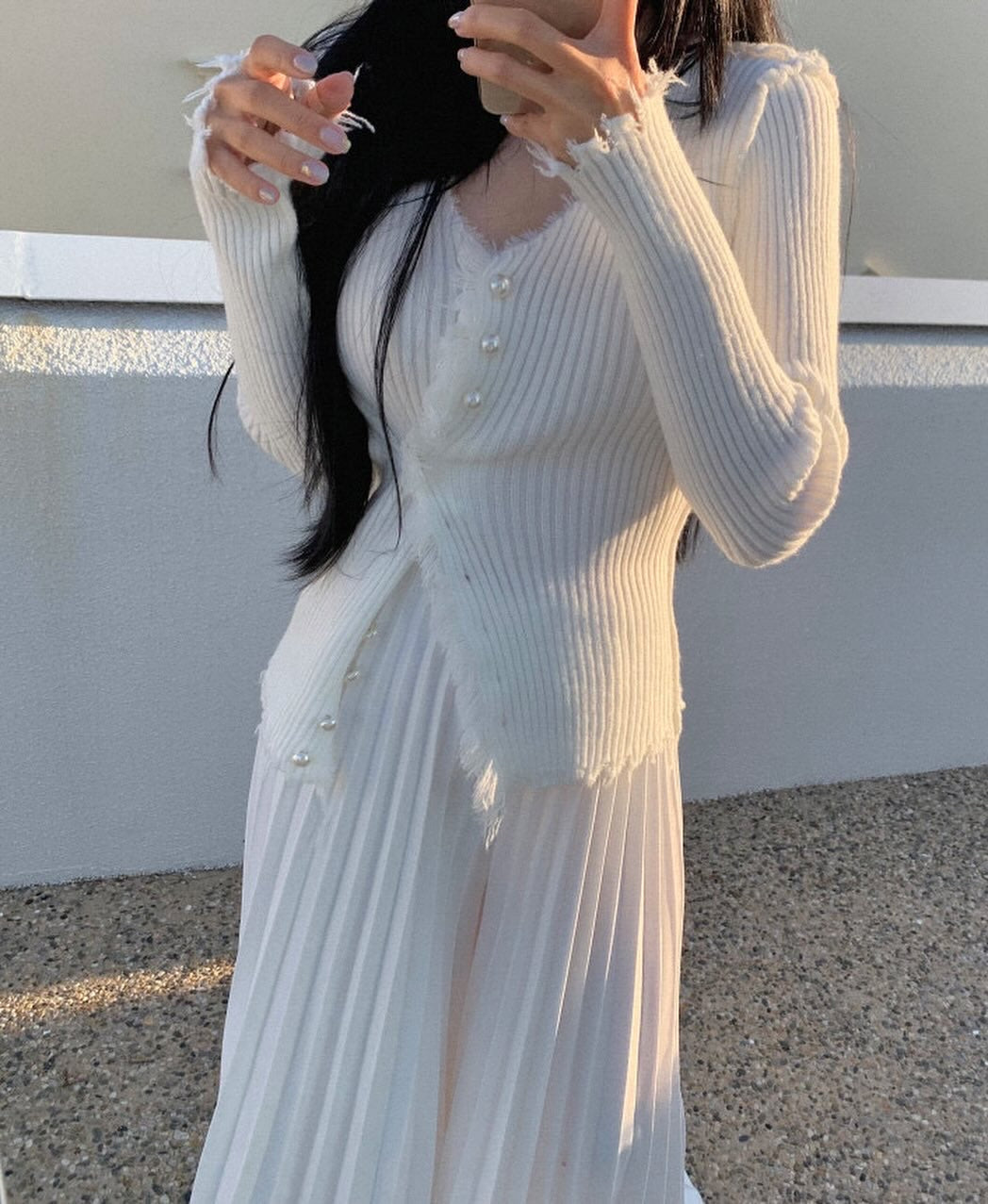 High-waisted wide-leg pants with a slimming effect and pleated texture