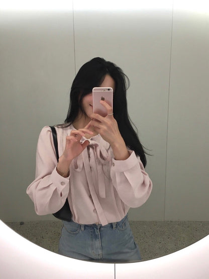 French-style pleated blouse with small buttons