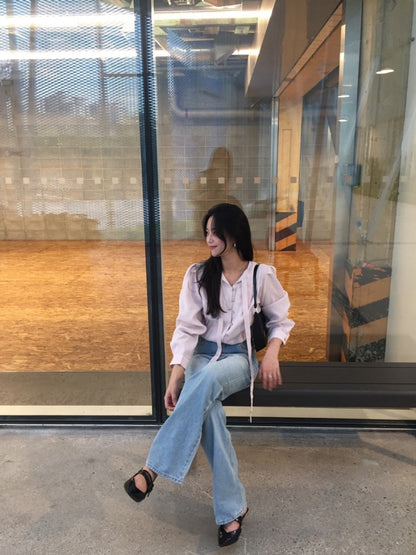 French-style pleated blouse with small buttons