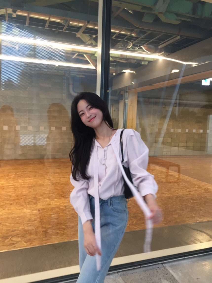 French-style pleated blouse with small buttons