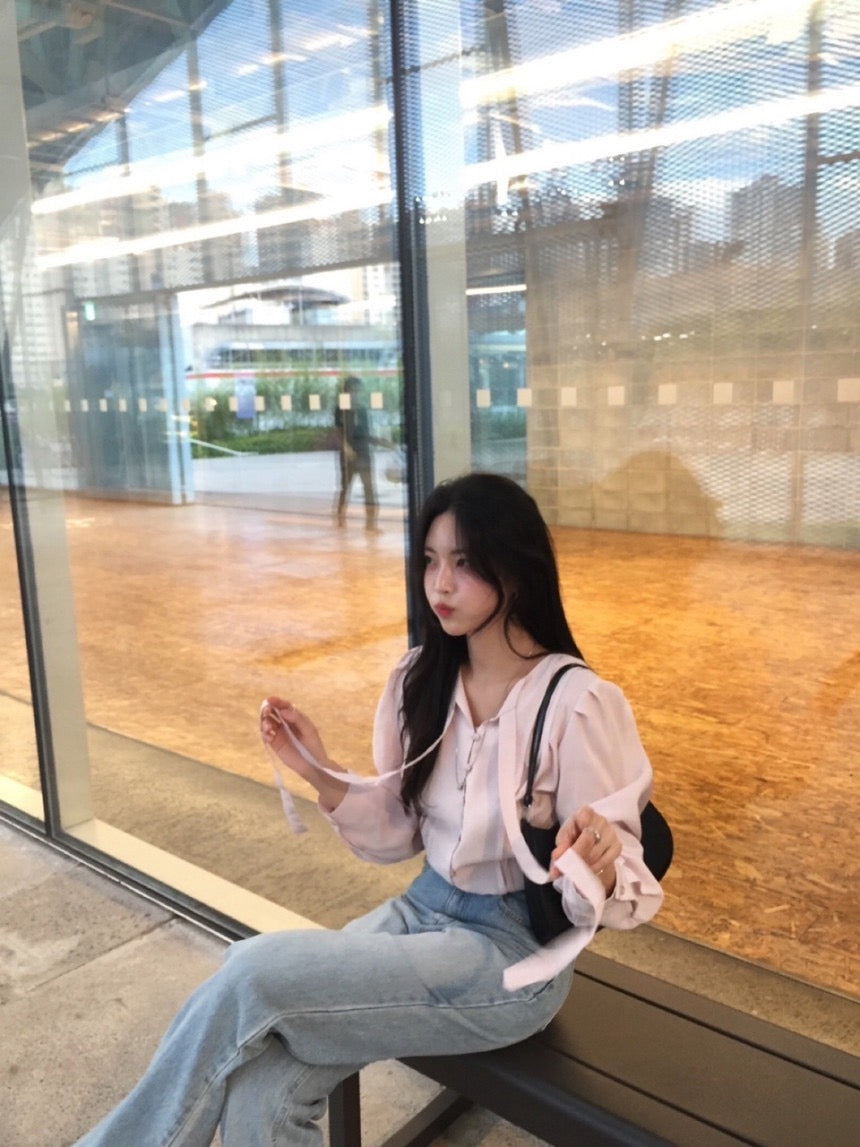 French-style pleated blouse with small buttons