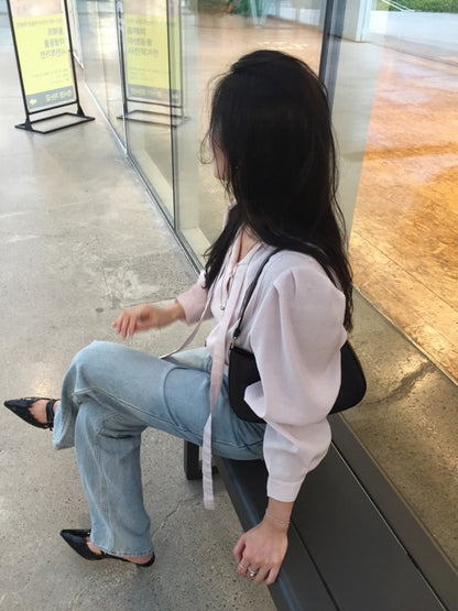 French-style pleated blouse with small buttons