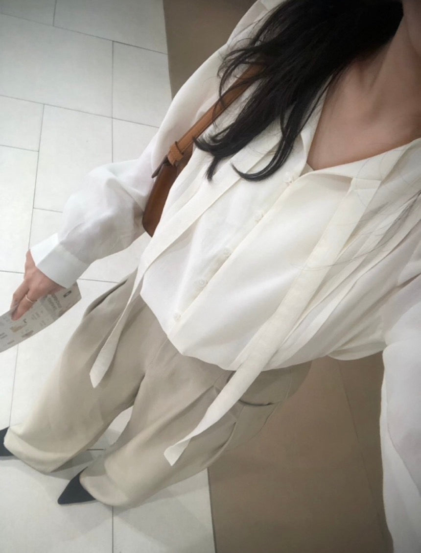 French-style pleated blouse with small buttons