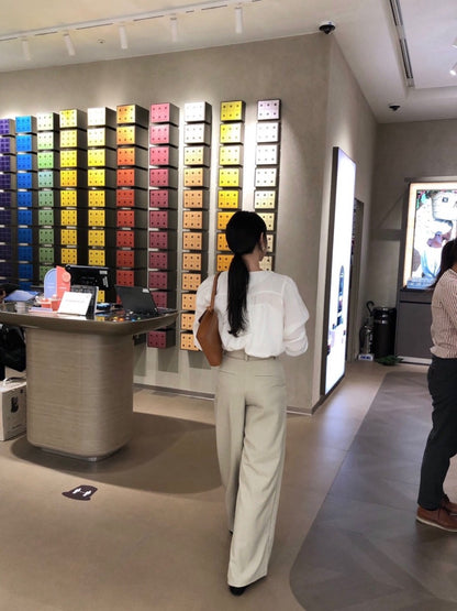 French-style pleated blouse with small buttons