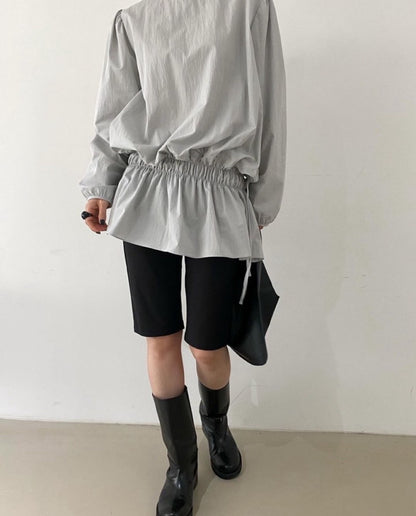 Round-neck tie-up shirt