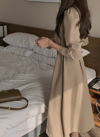 V領單排扣明顯收腰連身裙