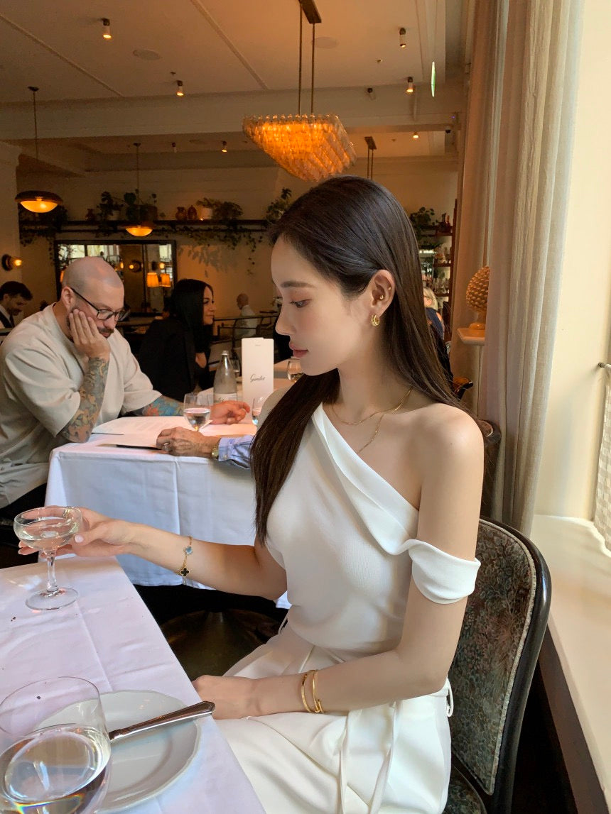 French-style asymmetrical off-shoulder top