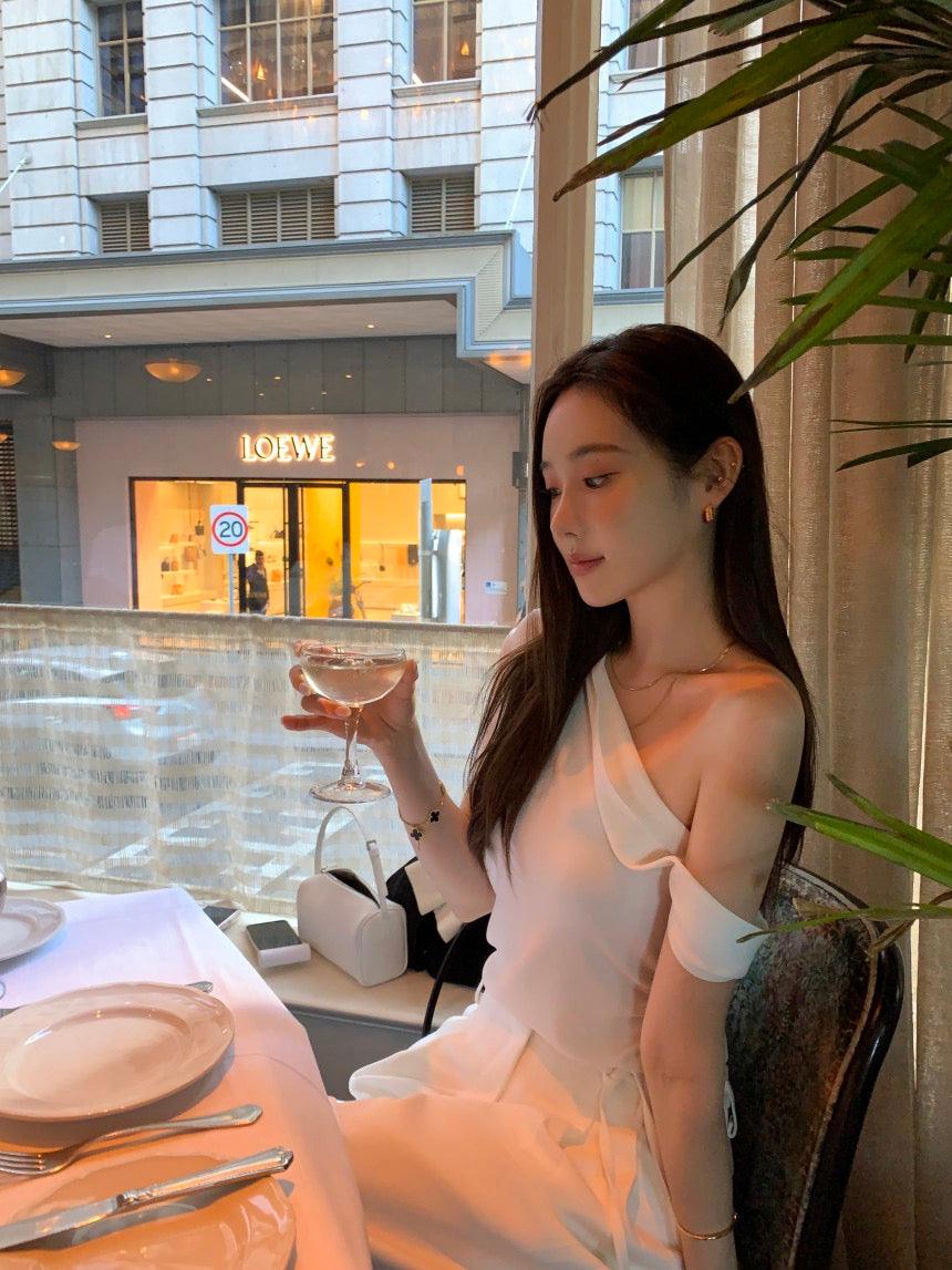 French-style asymmetrical off-shoulder top