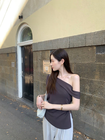 French-style asymmetrical off-shoulder top