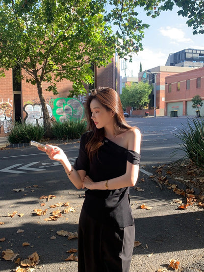 French-style asymmetrical off-shoulder top