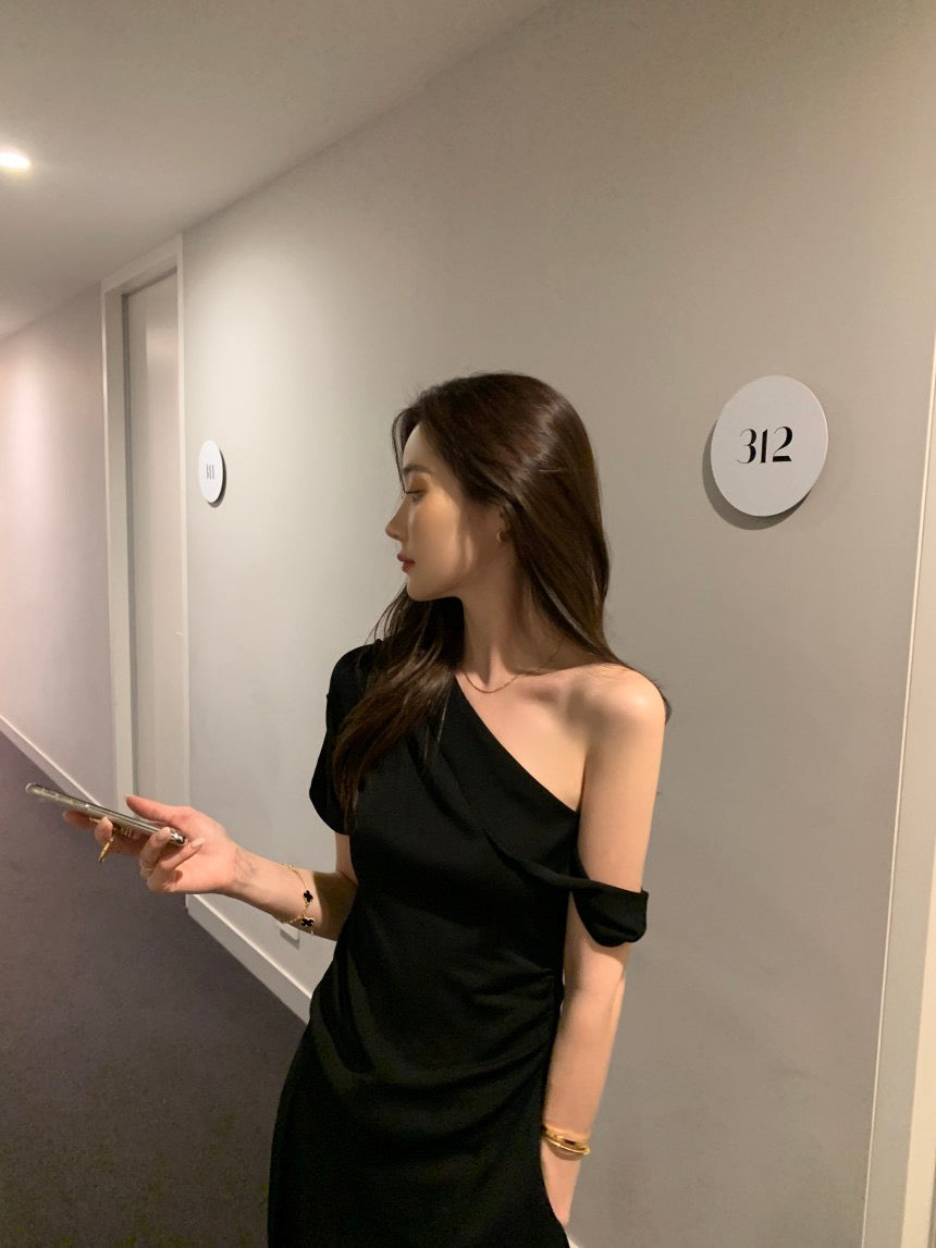 French-style asymmetrical off-shoulder top