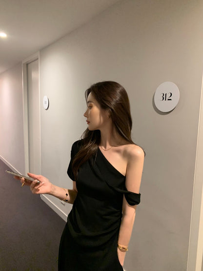 French-style asymmetrical off-shoulder top