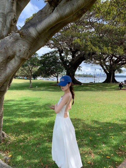 設計感露背吊帶連身裙