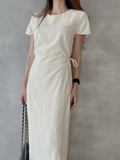 Round-neck side-tie waist-slit dress