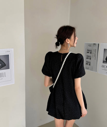 肌理感收腰顯瘦花苞連身裙