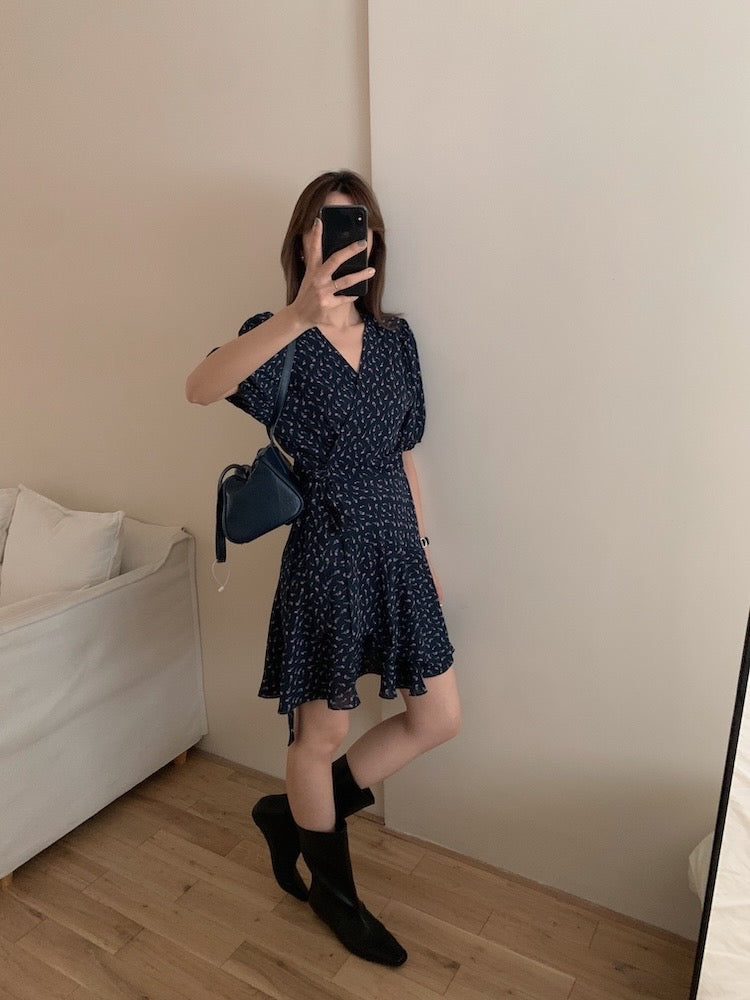 A one-piece tie-front floral dress