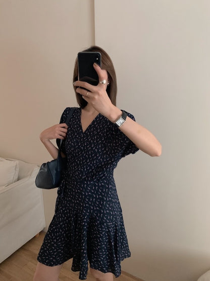 A one-piece tie-front floral dress