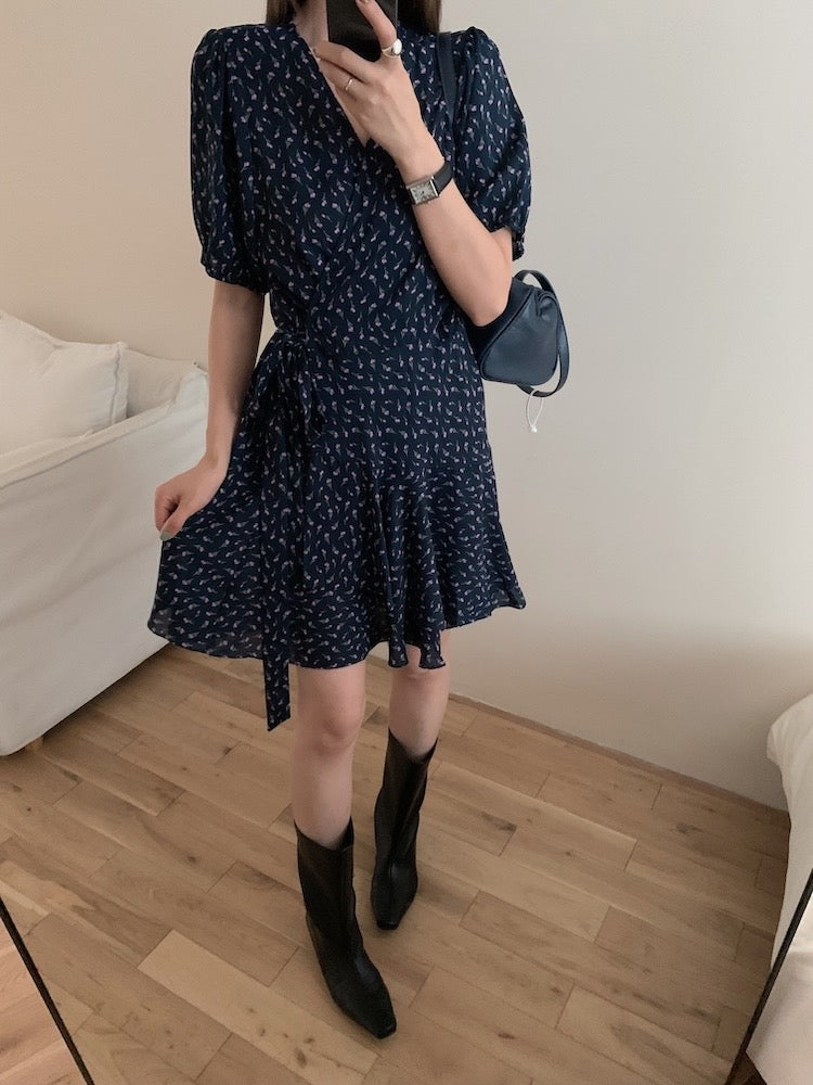 A one-piece tie-front floral dress