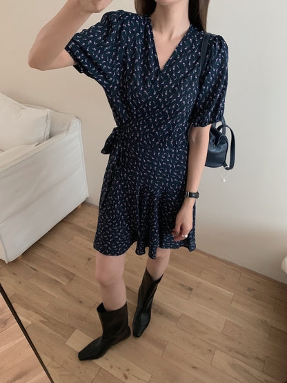A one-piece tie-front floral dress