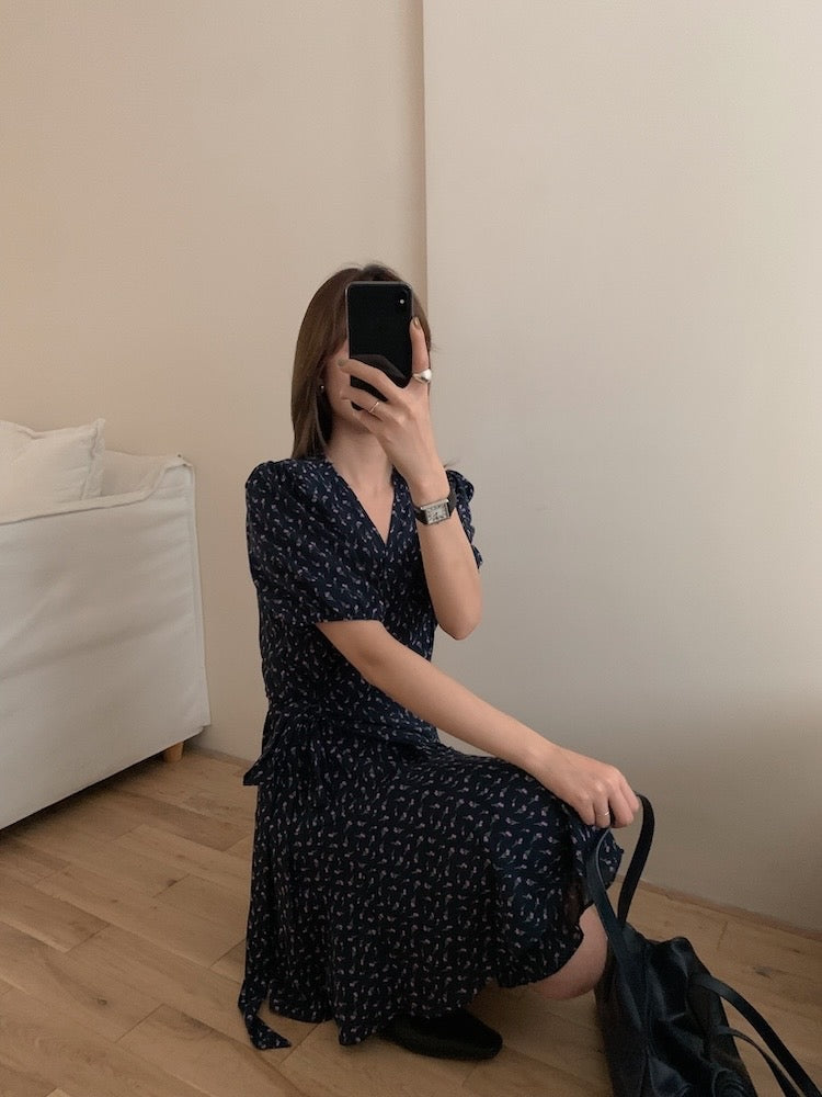 A one-piece tie-front floral dress