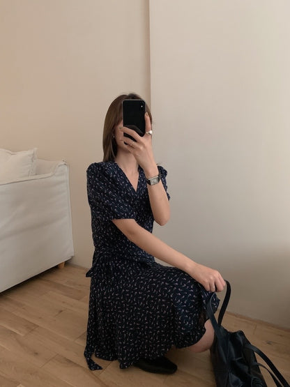 A one-piece tie-front floral dress