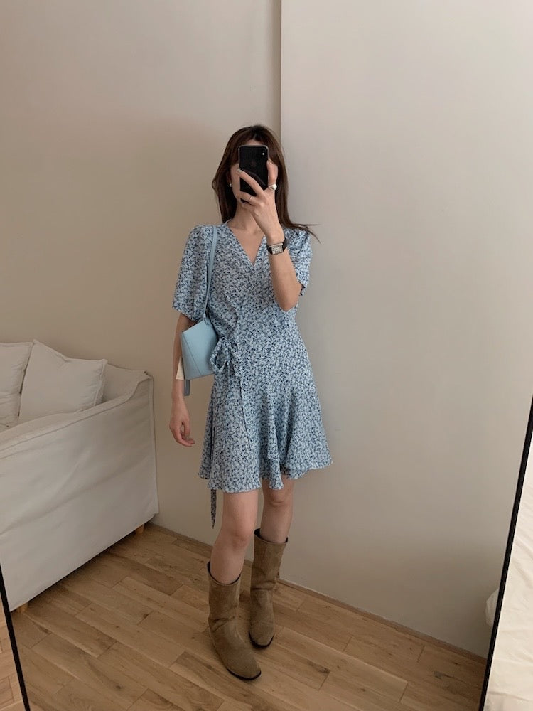 A one-piece tie-front floral dress