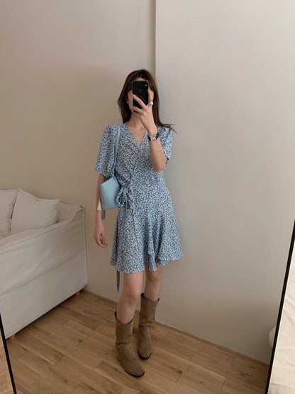 A one-piece tie-front floral dress